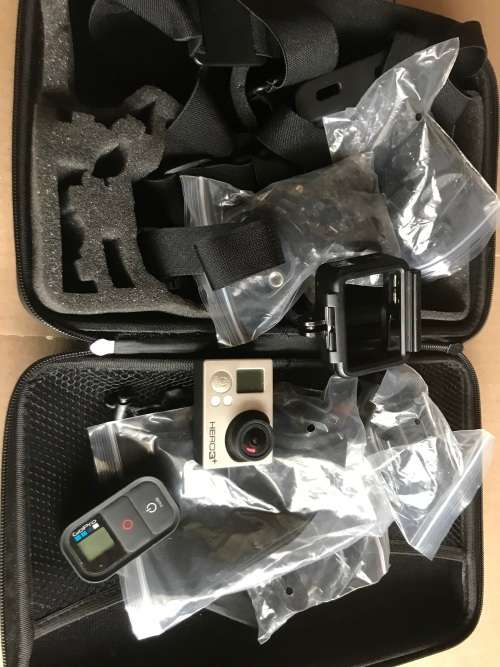 GOPRO HERO 3+ WITH  USB CABLE AND ALOT OF ACCESSORIES . GOOD CONDITION